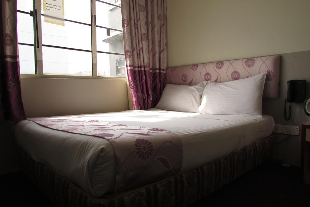 Meriton Hotel Singapore Rom bilde